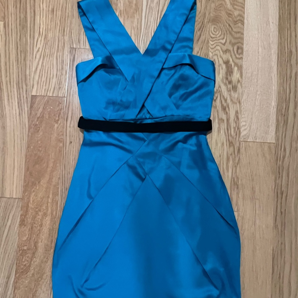 Junior dress, size small. Blue with black belt. Zipper in back.